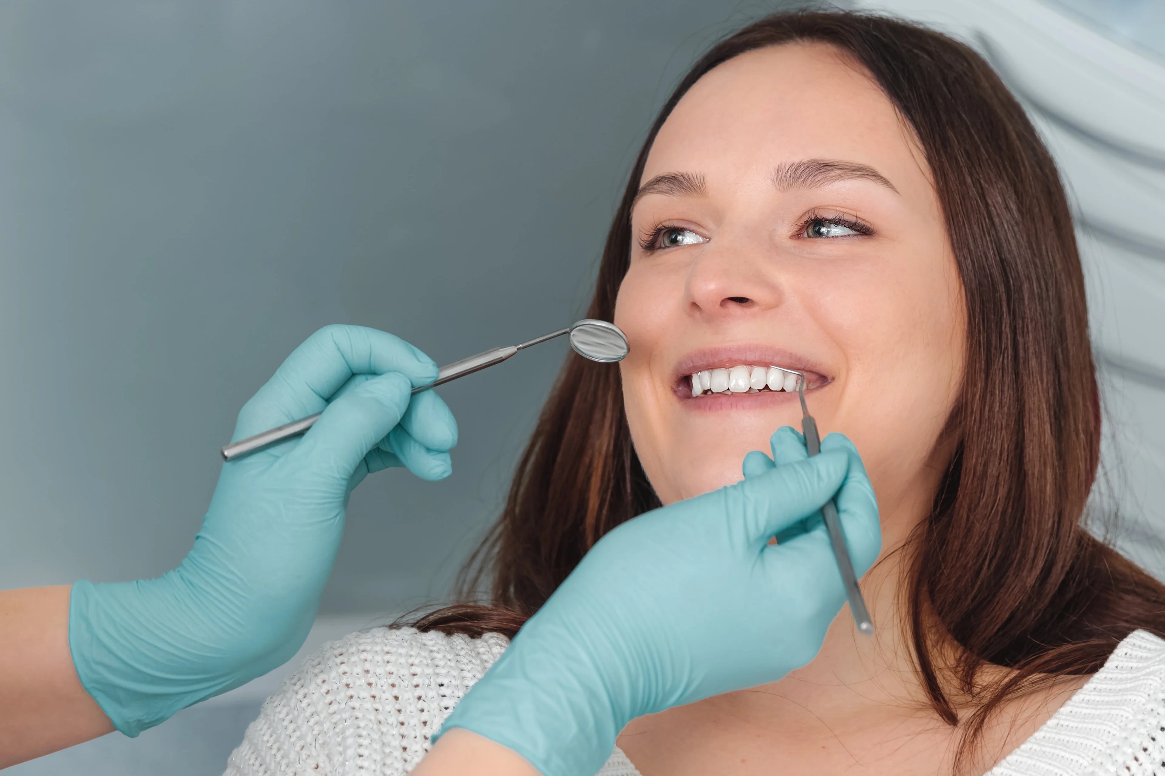 Dental check-up with patient smiling