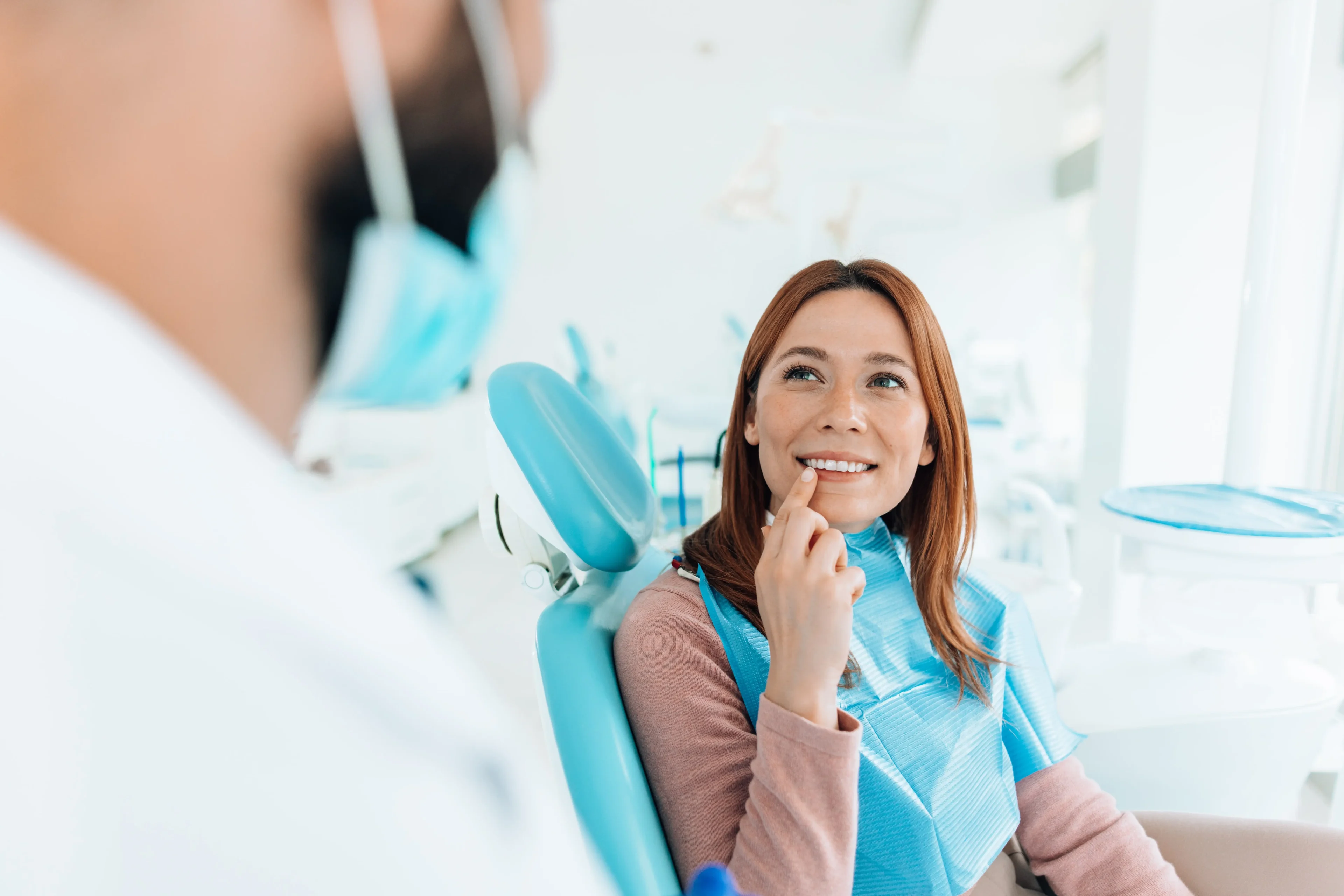 Dental consultation with a patient in chair