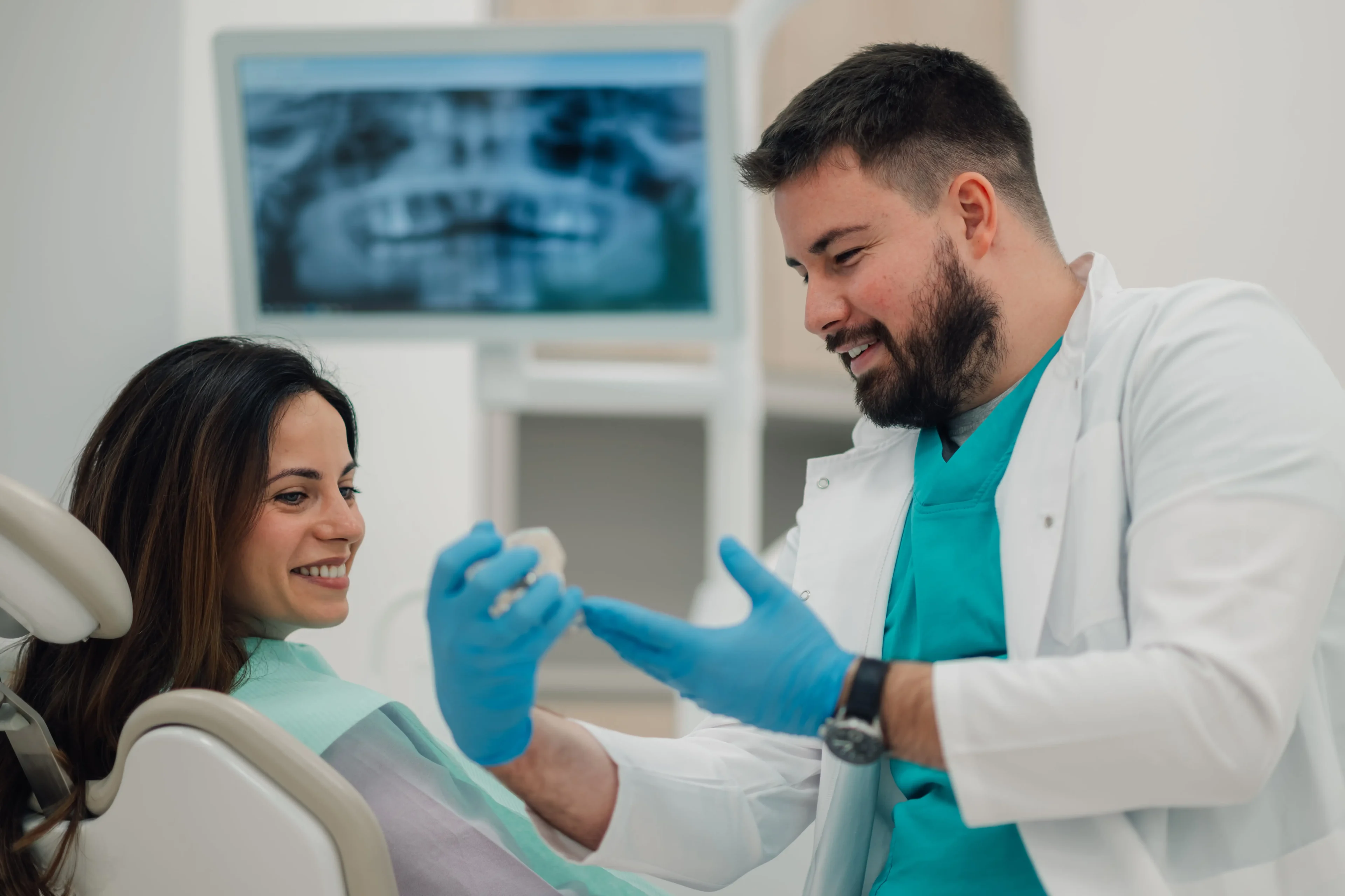 Dentist explaining treatment to patient